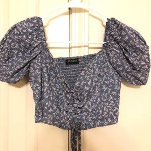 small blue crop top.